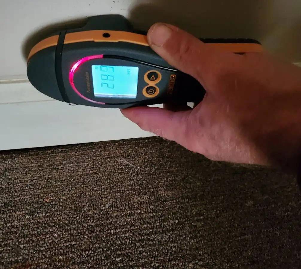 Moisture detection at baseboard during Sewage Cleanup & Sanitation in Coconut Creek